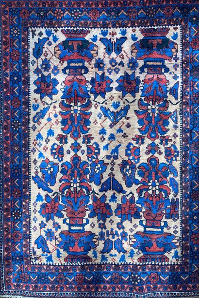 Oriental wool carpet. Decorated with polychrome...