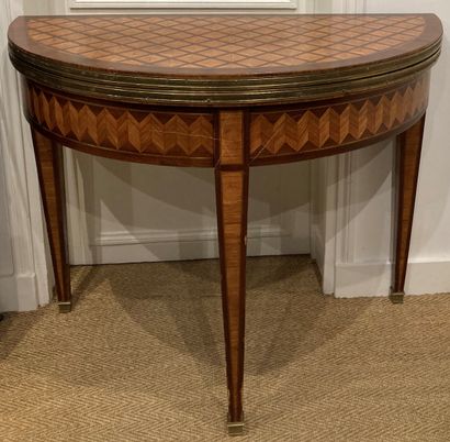 Half-moon game table, made of veneer and...