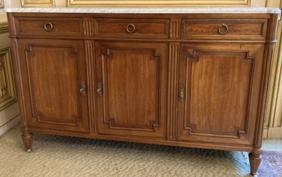 Pair of low molded mahogany sideboards. The...