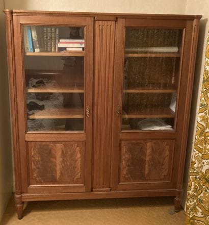 Mahogany bookcase with rounded uprights and...