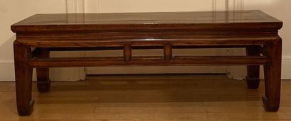 Bench in exotic wood, the belt openwork of...