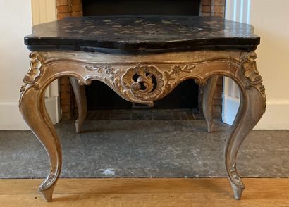 Coffee table, the poly-lobed lacquer top...