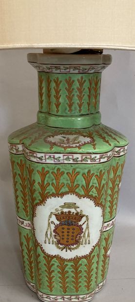 Porcelain vase of poly-lobed form. Decorated...