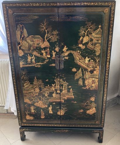 A piece of furniture with gold lacquer decoration...
