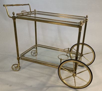 A gilt brass waiter's table, the two glass-bottomed...