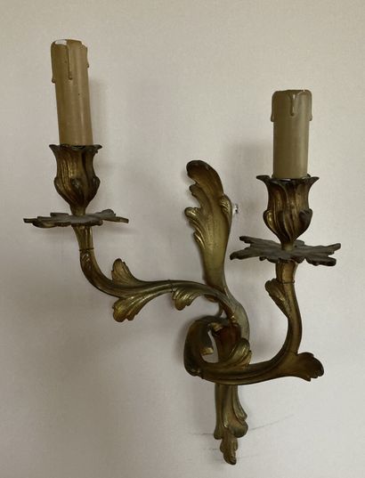 A pair of ormolu sconces with two lights....