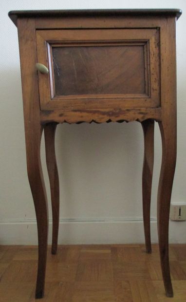 Moulded fruitwood bedside table, the front...