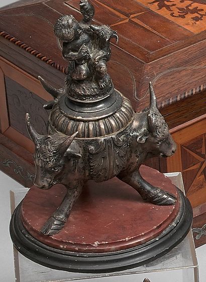 Silvered bronze inkwell, the lid showing...
