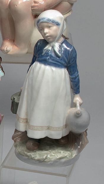 Porcelain statuette representing a small...