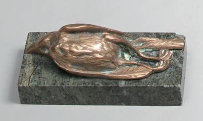 A gilt bronze paperweight with a dead bird....
