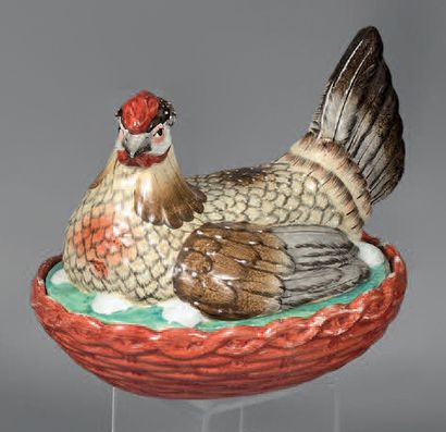 Polychrome glazed earthenware egg dish with...