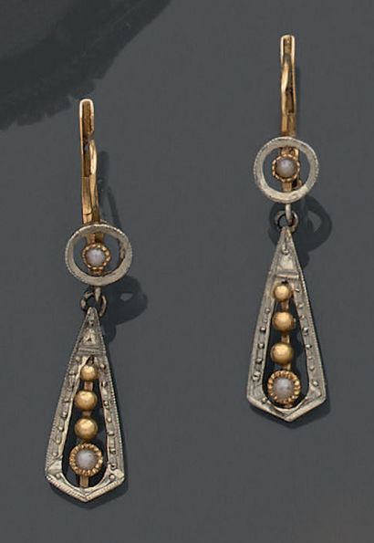 A pair of 18K (750) yellow and white gold...