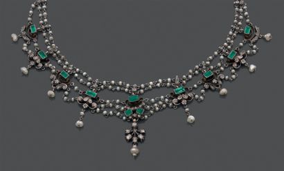 Silver and gilt silver (800) and gold drapery...
