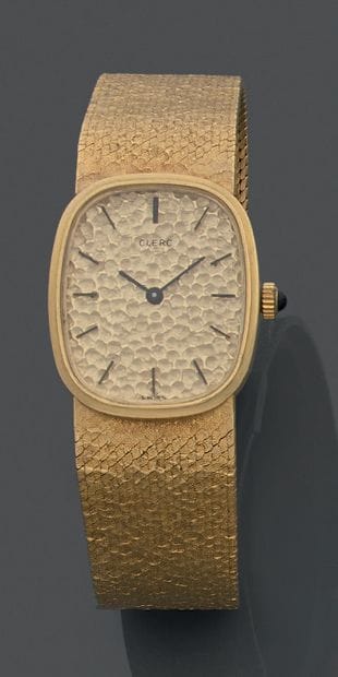 18K (750) yellow gold watch, the rounded...