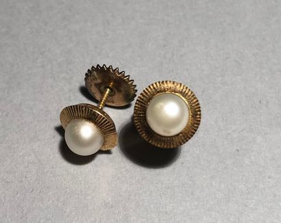 
Pair of 14K (585) yellow gold collar buttons...
