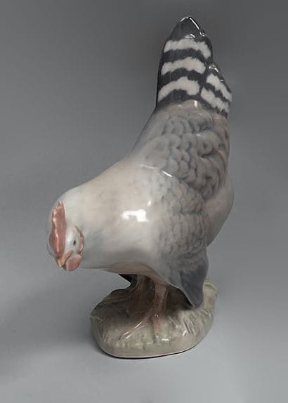 Statuette of a hen and another of a sparrow...