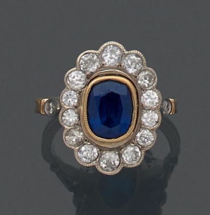 18K (750) yellow and white gold ring set...