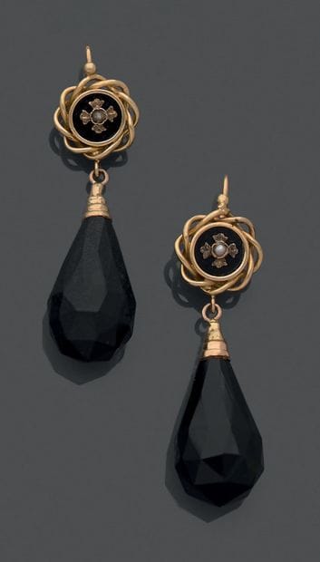 A pair of 18K (750) yellow gold, gilt metal...