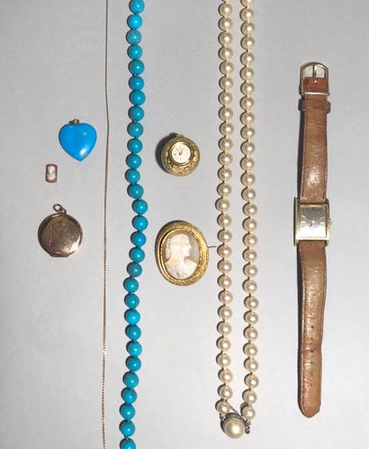 Set of gilt metal jewels: oval brooch decorated...