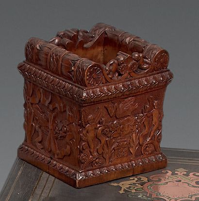 Carved wood pencil pot, representing a tomb...