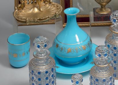 A turquoise opaline water glass, decorated...