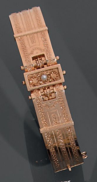A 14K (585) yellow gold open-worked bracelet,...