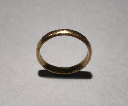 Wedding ring in 18K (750) yellow gold, divided...