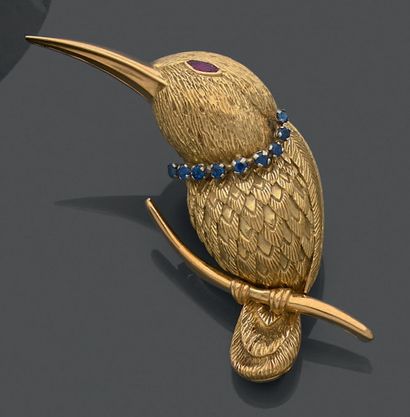 18K (750) yellow and white gold brooch featuring...
