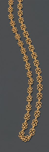 Long chain in 18K (750) yellow gold, the...