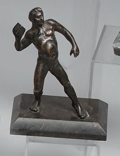 Statuette in patinated bronze, representing...