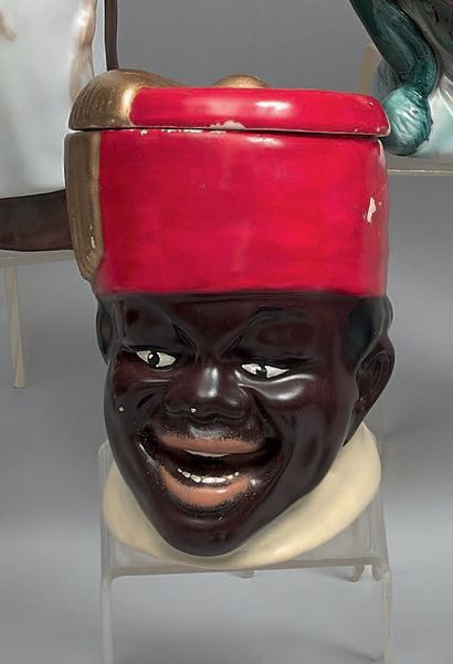 A polychrome earthenware tobacco jar, with...