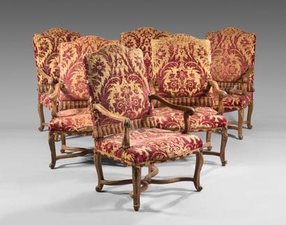 Suite of six armchairs in natural wood molded...