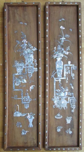 Pair of panels in rosewood with mother-of-pearl...