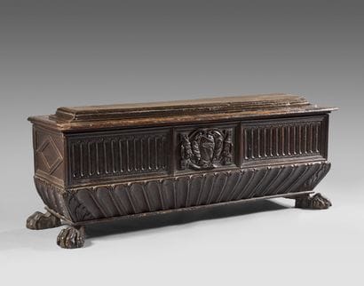 Cassone in fruitwood, the front carved with...