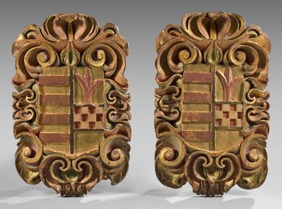Pair of large coats of arms in gilded wood...