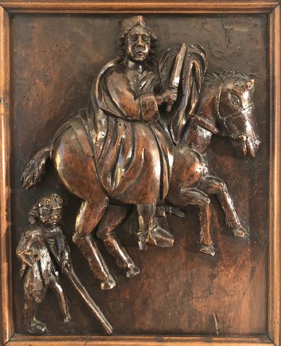 Panel in fruit wood and carved representing...