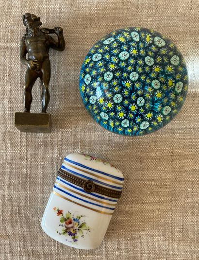 Set of trinkets: patinated bronze seal representing...