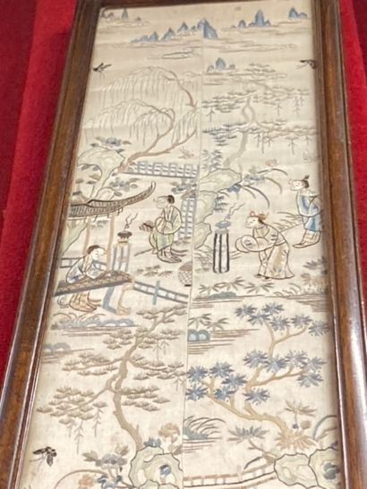 Set of three embroidered silk panels: one...