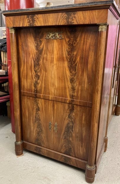 Mahogany and mahogany veneer secretary. Opens...