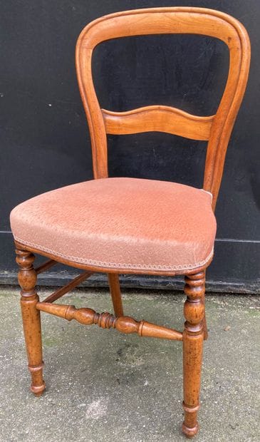 Suite of four chairs in natural wood, the...
