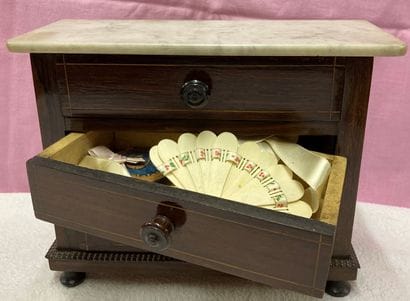 Miniature chest of drawers in rosewood inlaid...