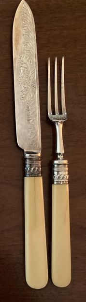 Suite of twelve forks and twelve fruit knives,...