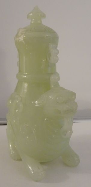 CHINA, 20th century. Set in celadon serpentine:...