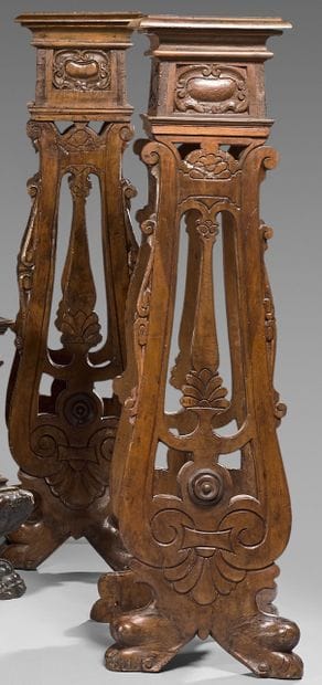 Pair of molded and carved fruitwood saddles....