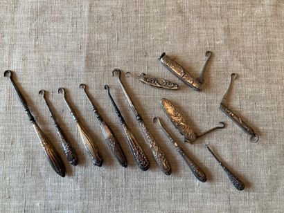 
Set of about ten small boot pullers, handles...
