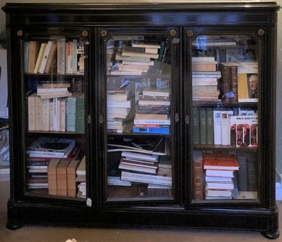 Bookcase with height of support out of blackened...