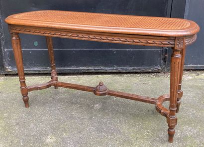 Piano bench in natural wood, the rounded...