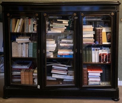 Bookcase with height of support out of blackened...