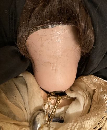 Doll, the head in porcelain, marked 
