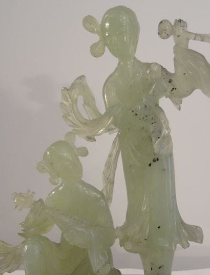 CHINA, 20th century. Set in celadon serpentine:...